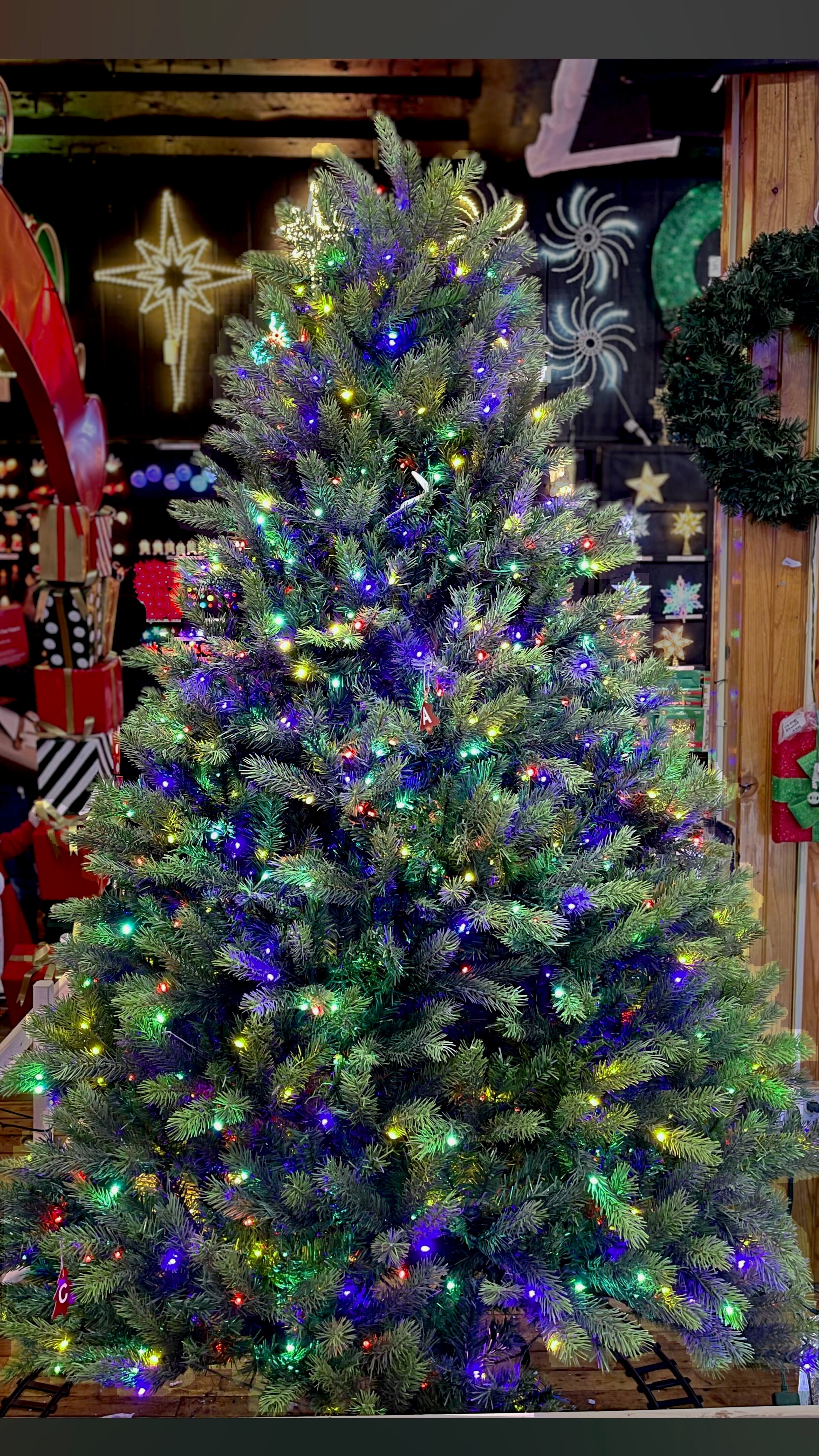 Puleo International 7.5ft Pre-Lit Kensington Fir Tree with Dual Lights and "Real Feel"