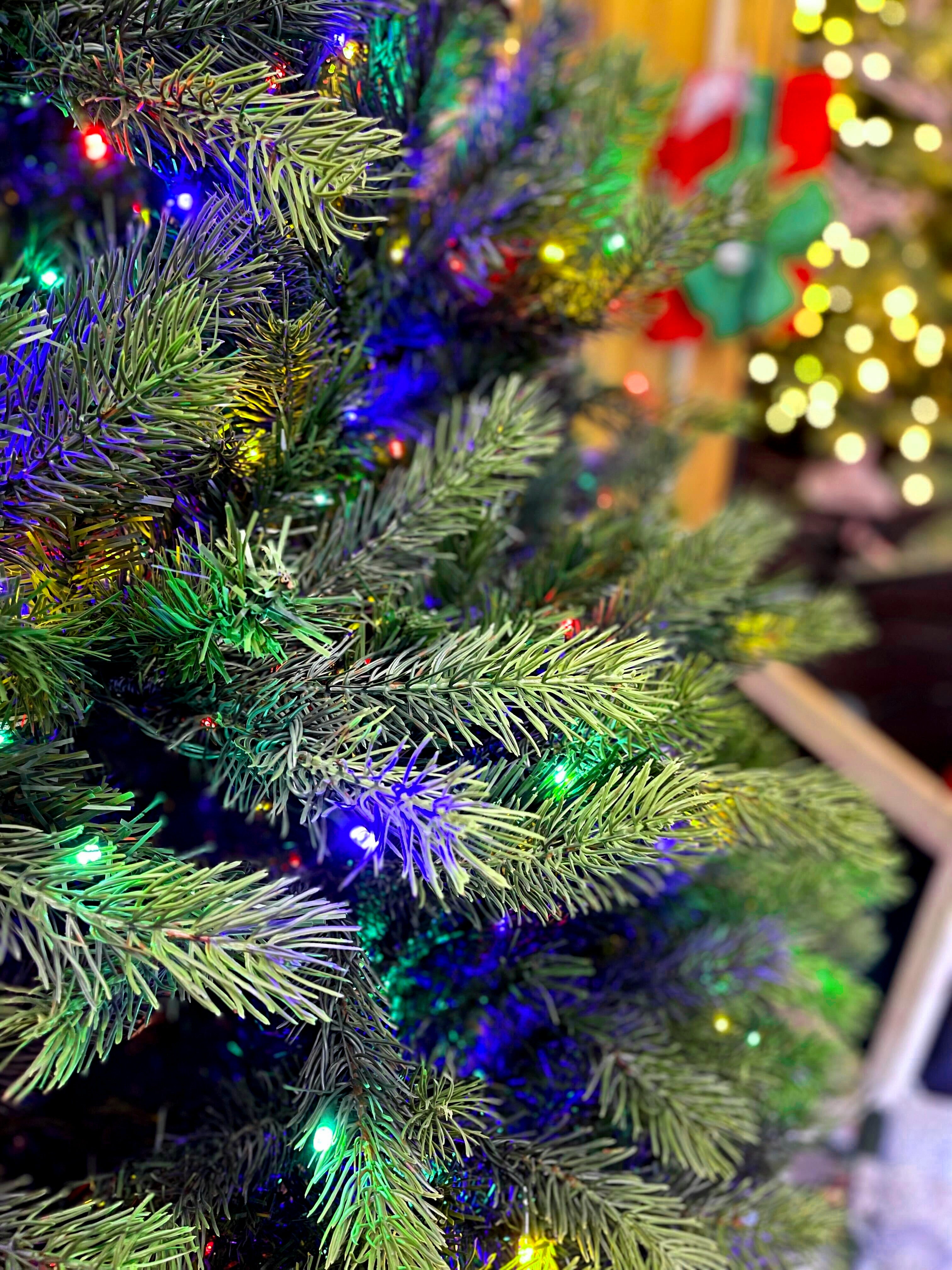 Puleo International 7.5ft Pre-Lit Kensington Fir Tree with Dual Lights and "Real Feel"