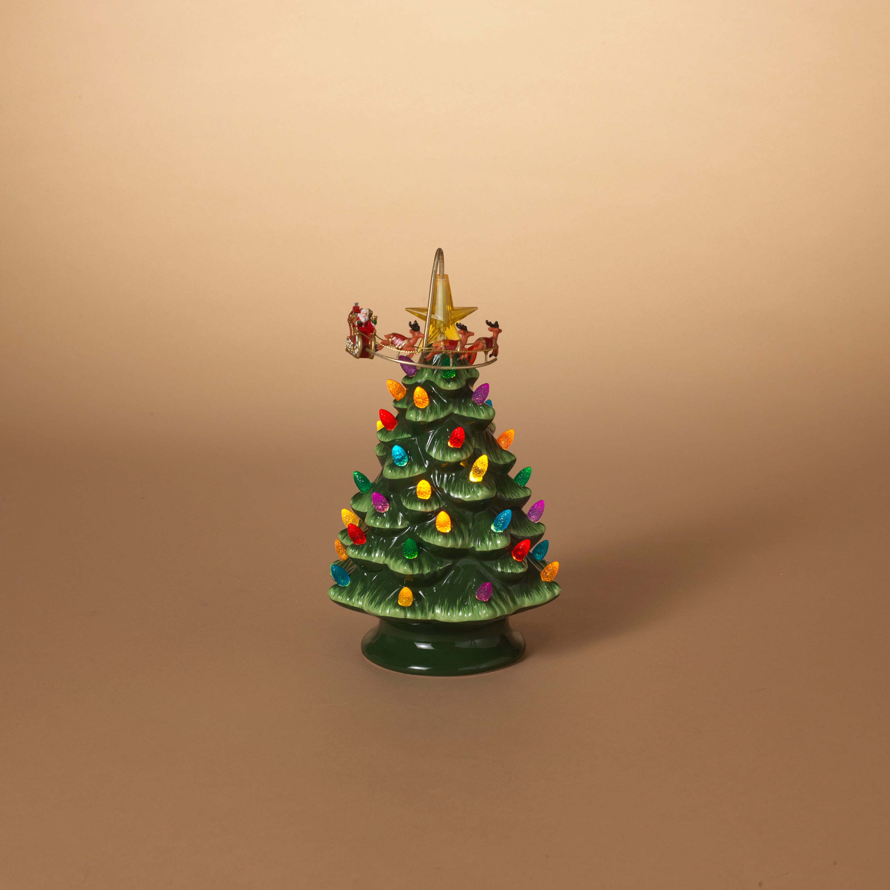 Estate style 10 in H Battery Operated Lighted Ceramic Holiday Christmas Tree with Rotating Sleigh 2657590EC