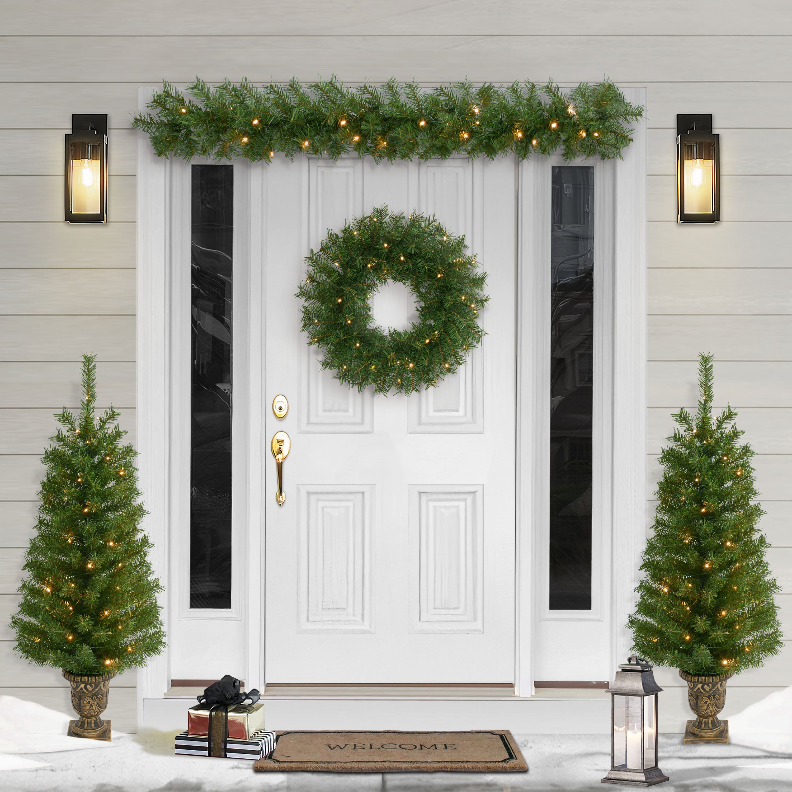 4-Piece Pre-Lit Christmas Décor Set Featuring 2 Trees, 1 Wreath, and 1 Garland