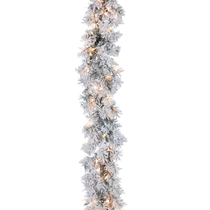 Sterling 9 ft. Pre Lit Warm White LED Heavy Flocked Spruce Garland