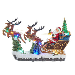 Kurt Adler 8.7-Inch Battery-Operated LED Musical Santa and Sleigh Table Piece